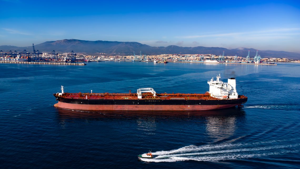 Oil tanker under way is leaving Algeciras port. 2024. Photo by Capt. Tymur Rudov Product