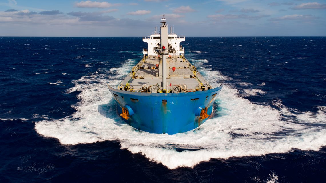 Bulk carrier under way in the open sea, overtaking other ship Product